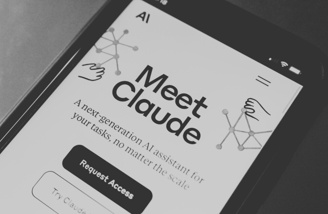 Website of Claude seen in an iPhone screen (Shutterstock)